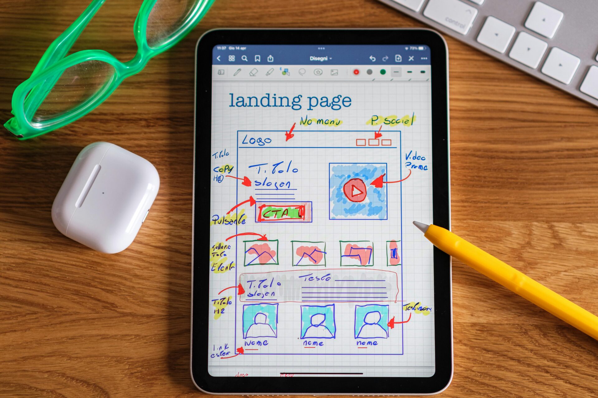 A landing page design plan on a tablet.
